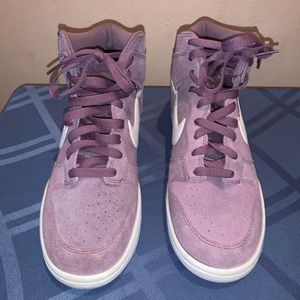 Nike Dunk High women’s sneakers.